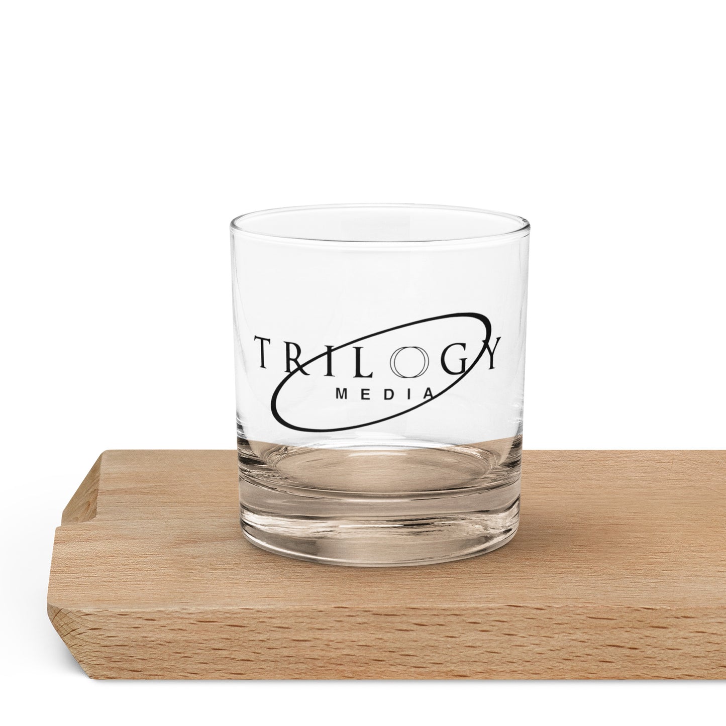 Trilogy Media Logo | Rocks glass